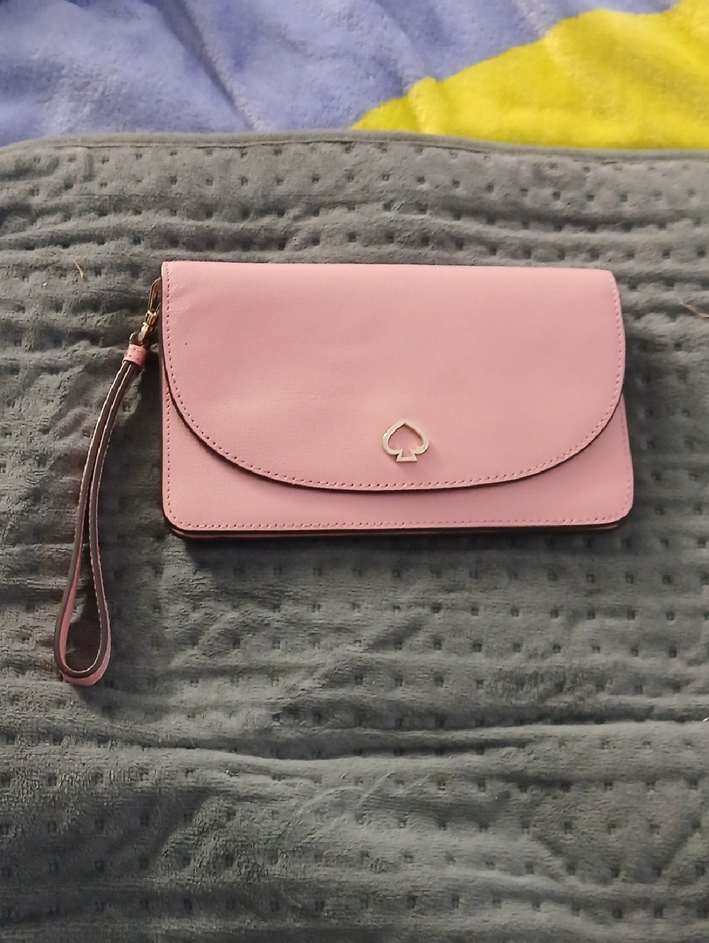 kate spade pink leather wristlet clutch with gold spade logo